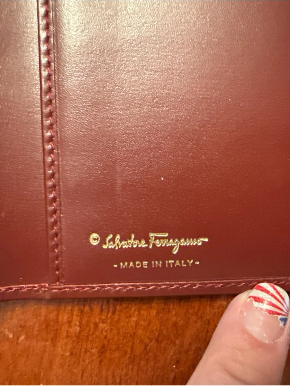 Salvatore Ferragamo Burgundy Leather Wallet with Gold Hardware